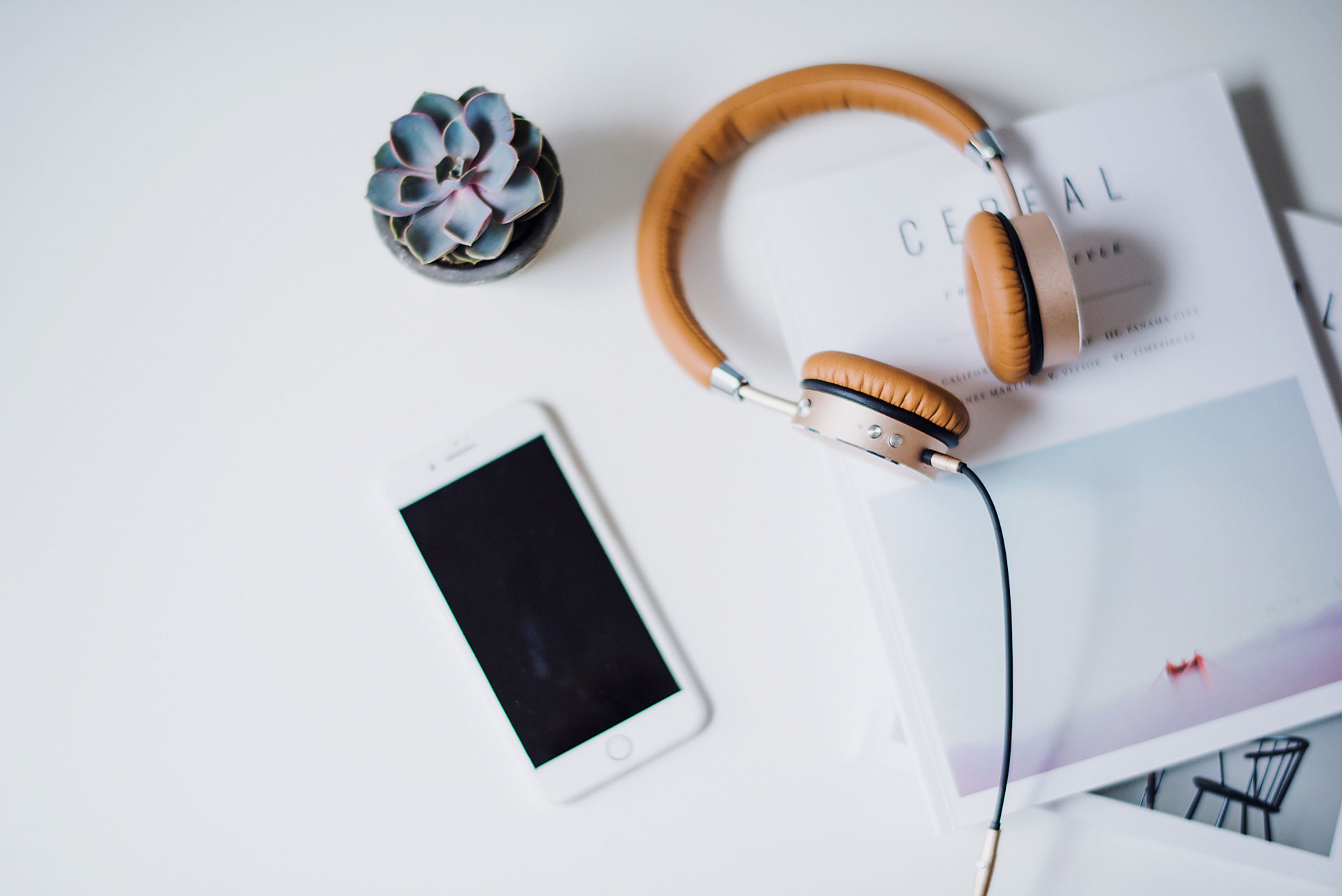 Desk with headphones | Insurance Broker Tauranga